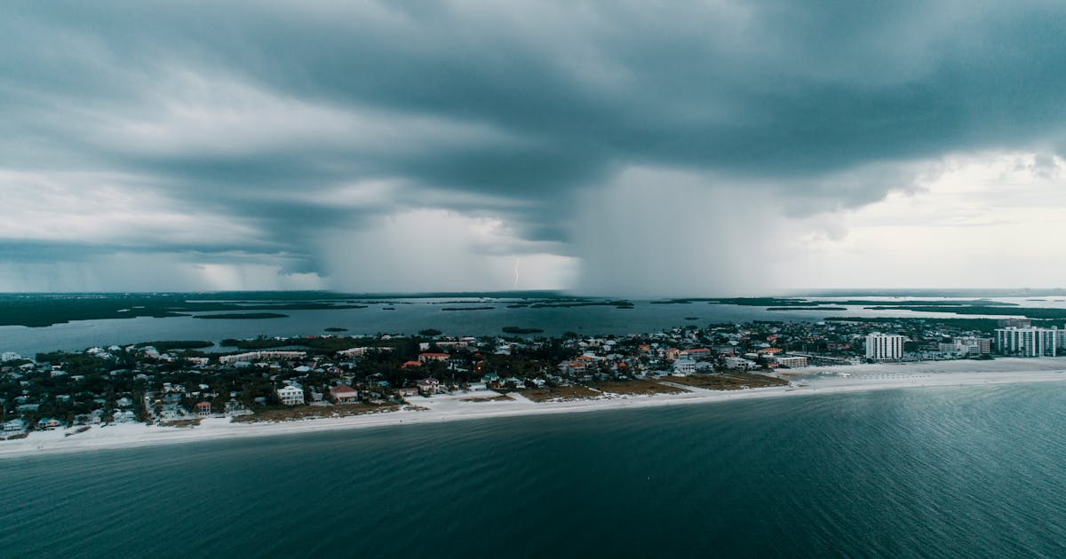 Storm approaching the Florida coast, representing hurricane season and protecting health insurance coverage in 2026